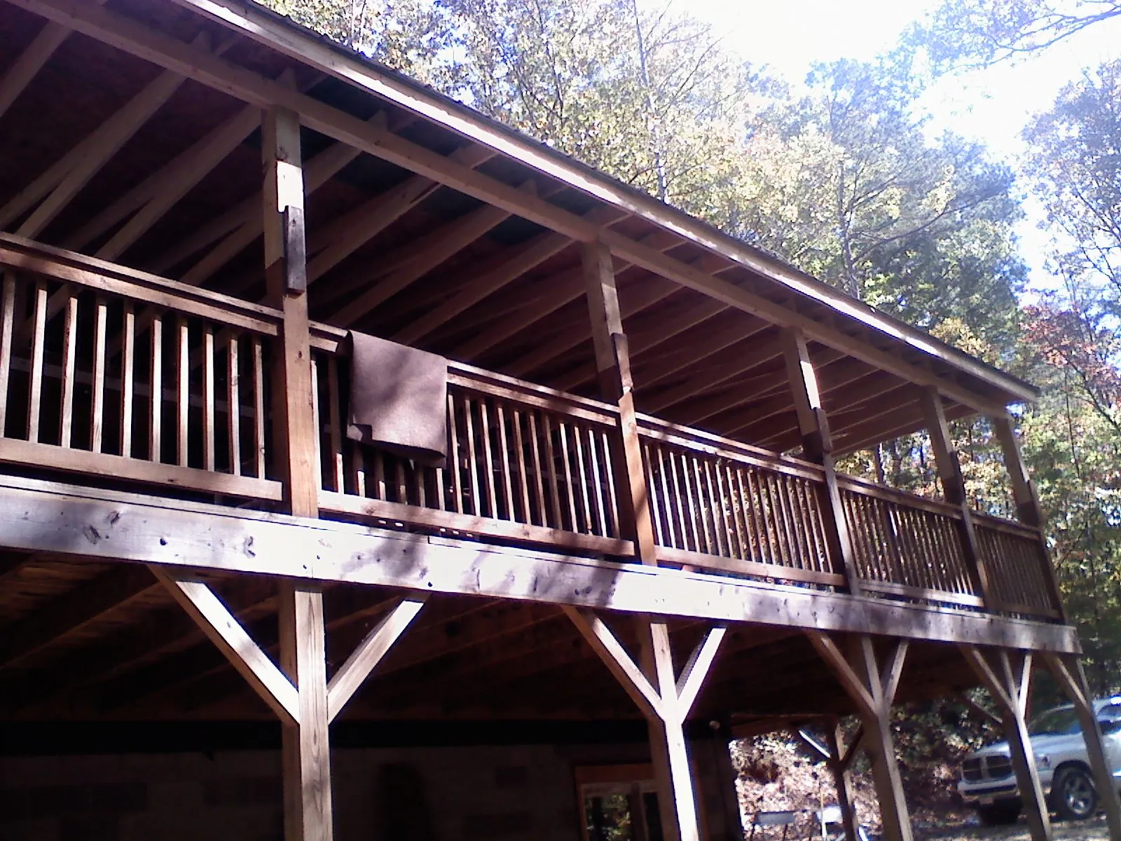Timber framing under a new elevated porch and deck — Roof Leak Repair in Blue Mound by Roofing Brothers